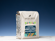 Kaldi's Coffee Roasting Co. coffee bag on a white surface with a blue gradient background