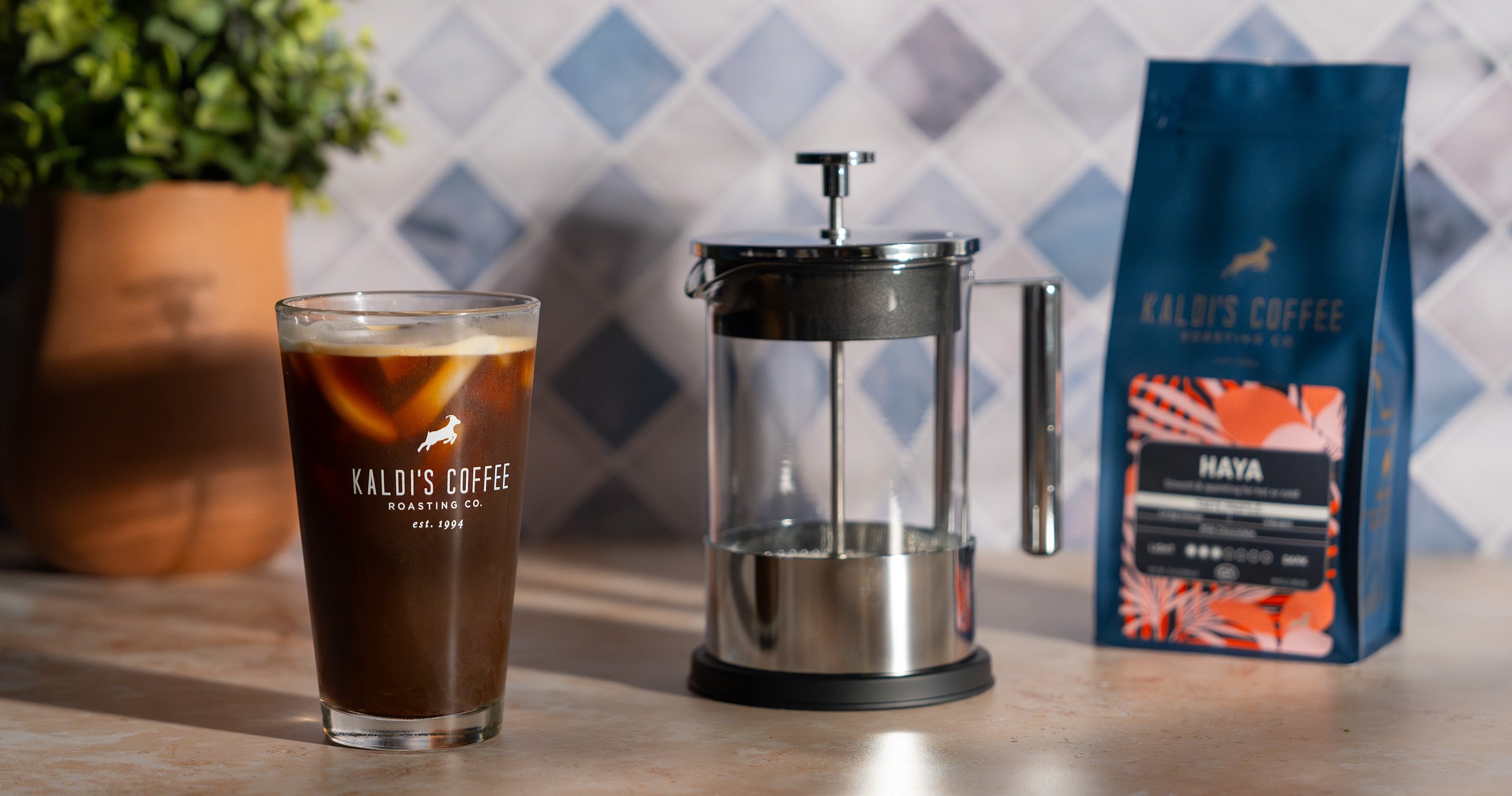 Yama 6 Cup French Press next to a glass of cold brew coffee