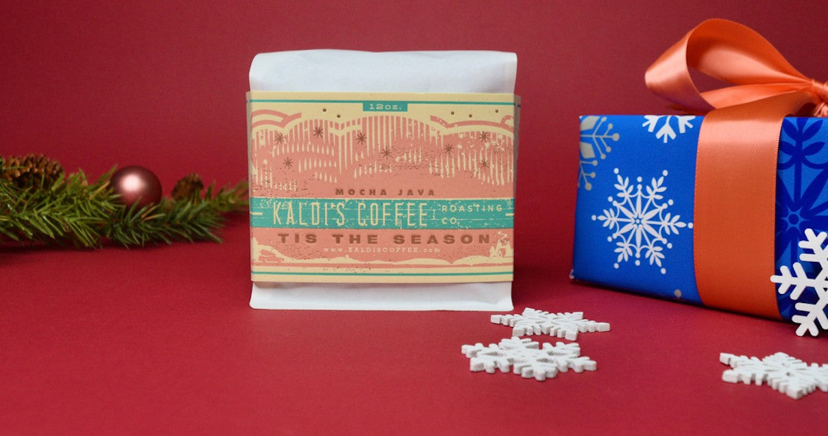 12oz bag of 'Tis the Season Coffee Blend next to a present