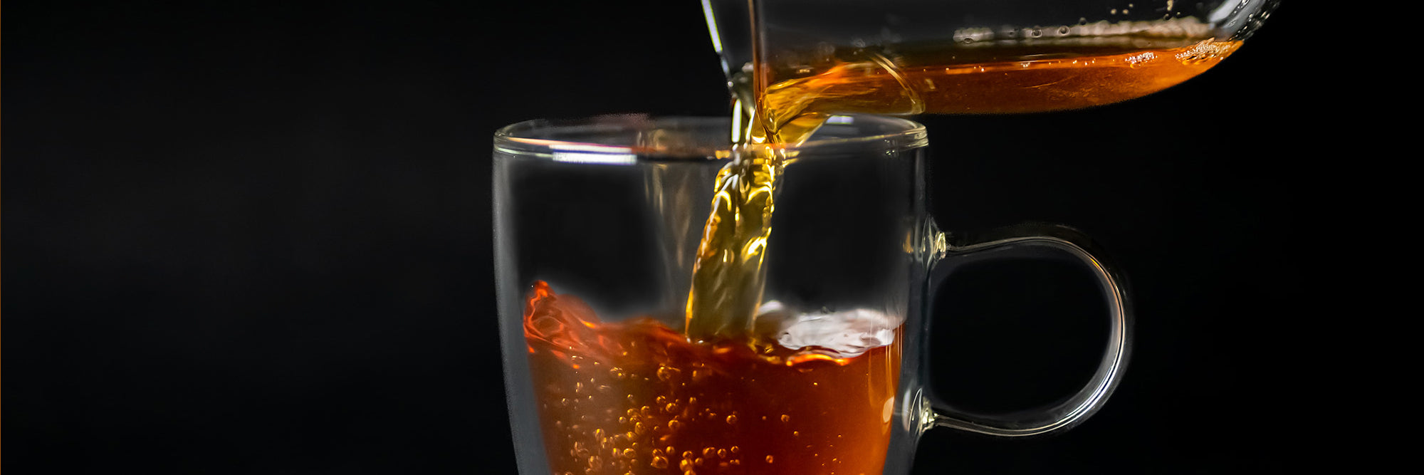 A mug is filled with the Spiced Cinnamon Hot Toddy