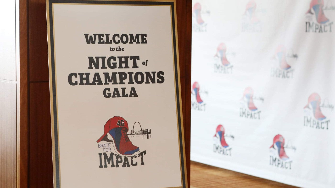 Sign in front of the Night of Champions Gala