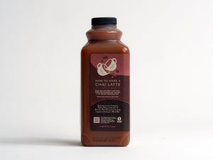 32oz bottle of Firepot Organic Masala Chai Concentrate (left side view)