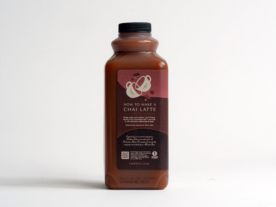 32oz bottle of Firepot Organic Masala Chai Concentrate (left side view)