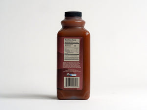 32oz bottle of Firepot Organic Masala Chai Concentrate (right view)