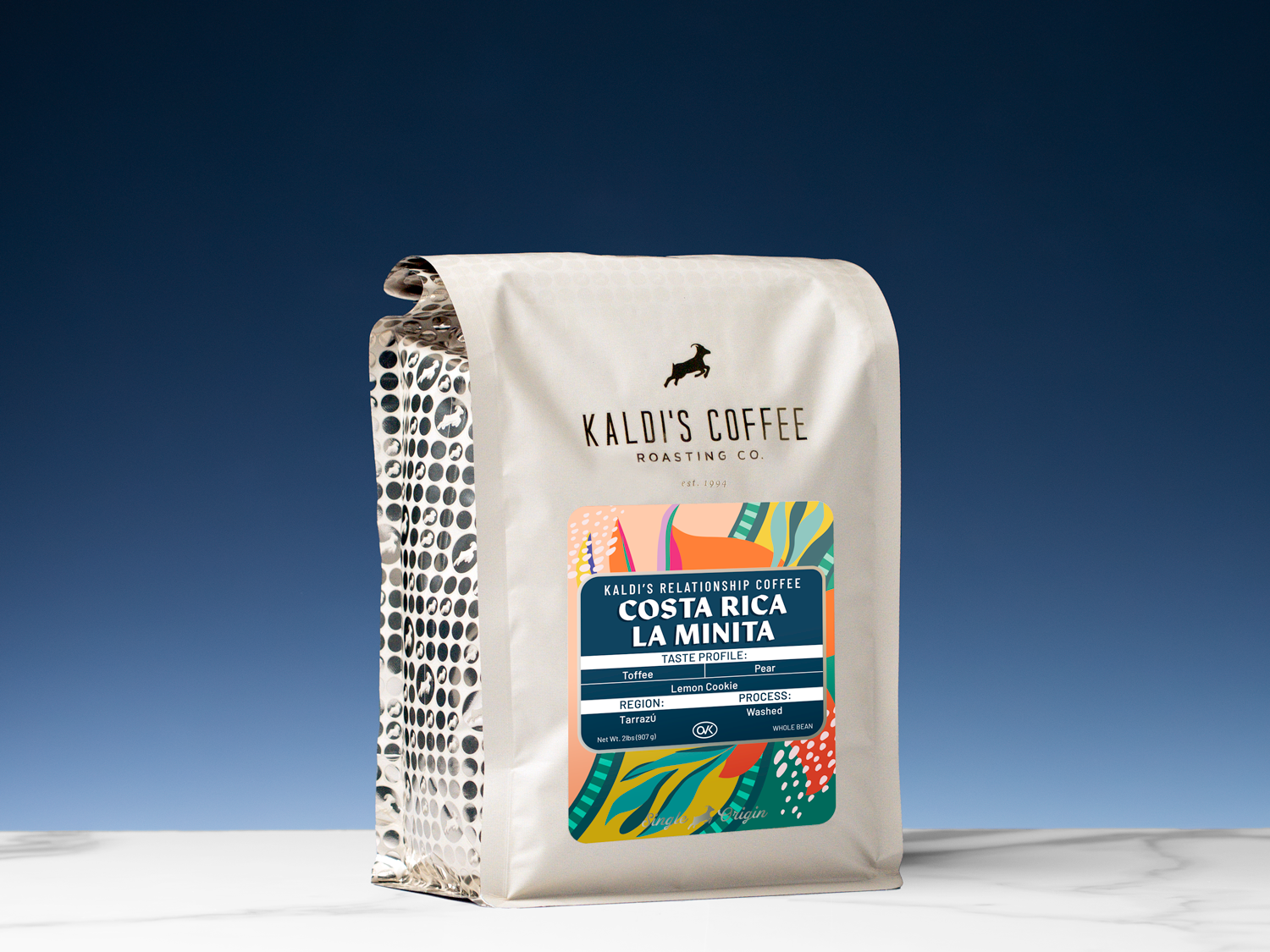 Kaldi's Coffee Costa Rica La Minita coffee bag on a blue gradient background