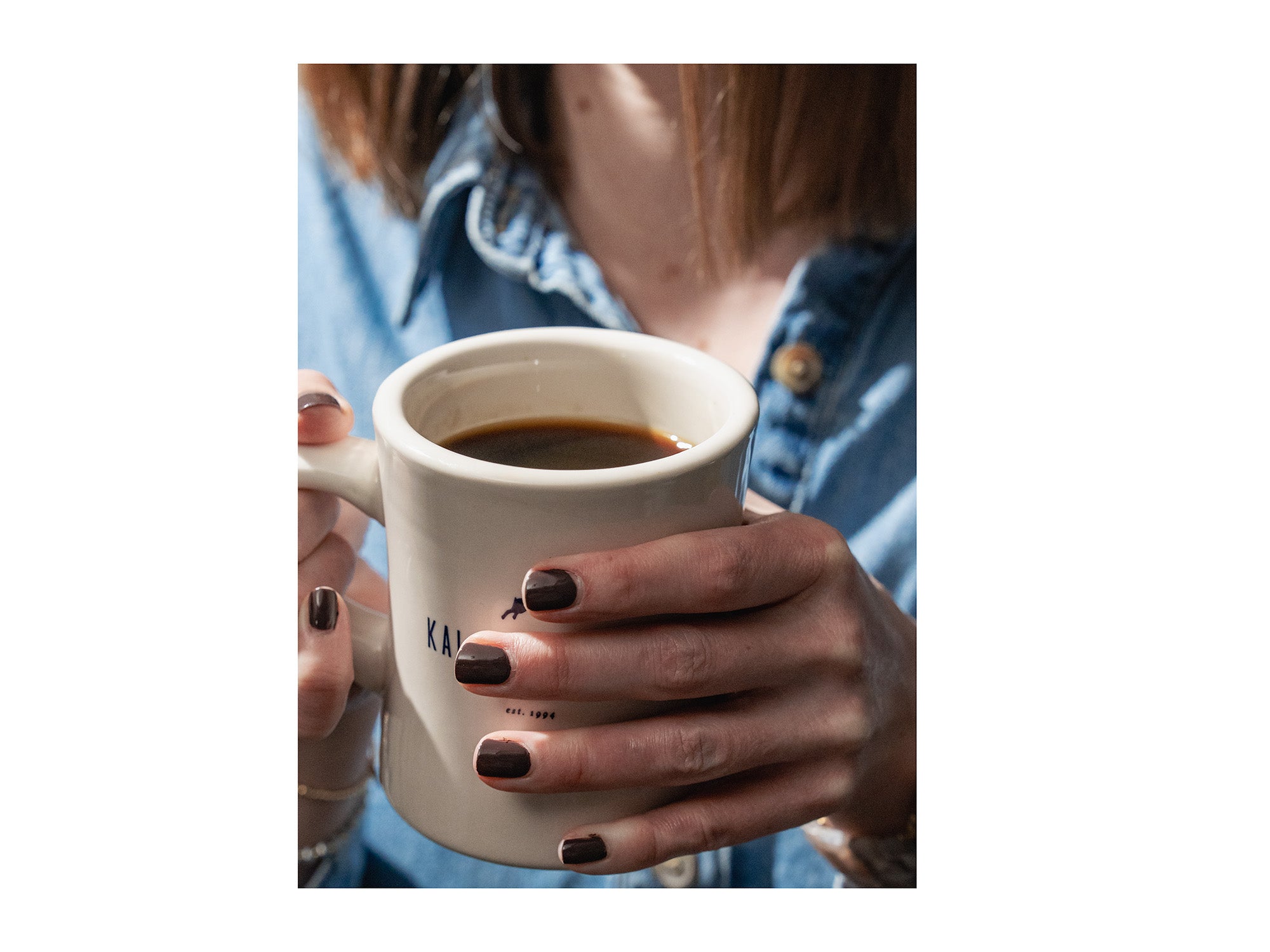 image of Kaldis Coffee diner mug in hand