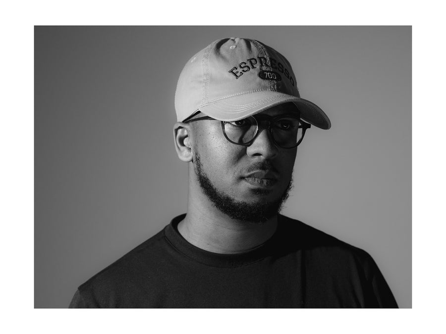 Image of front of embroidered hat in black and white