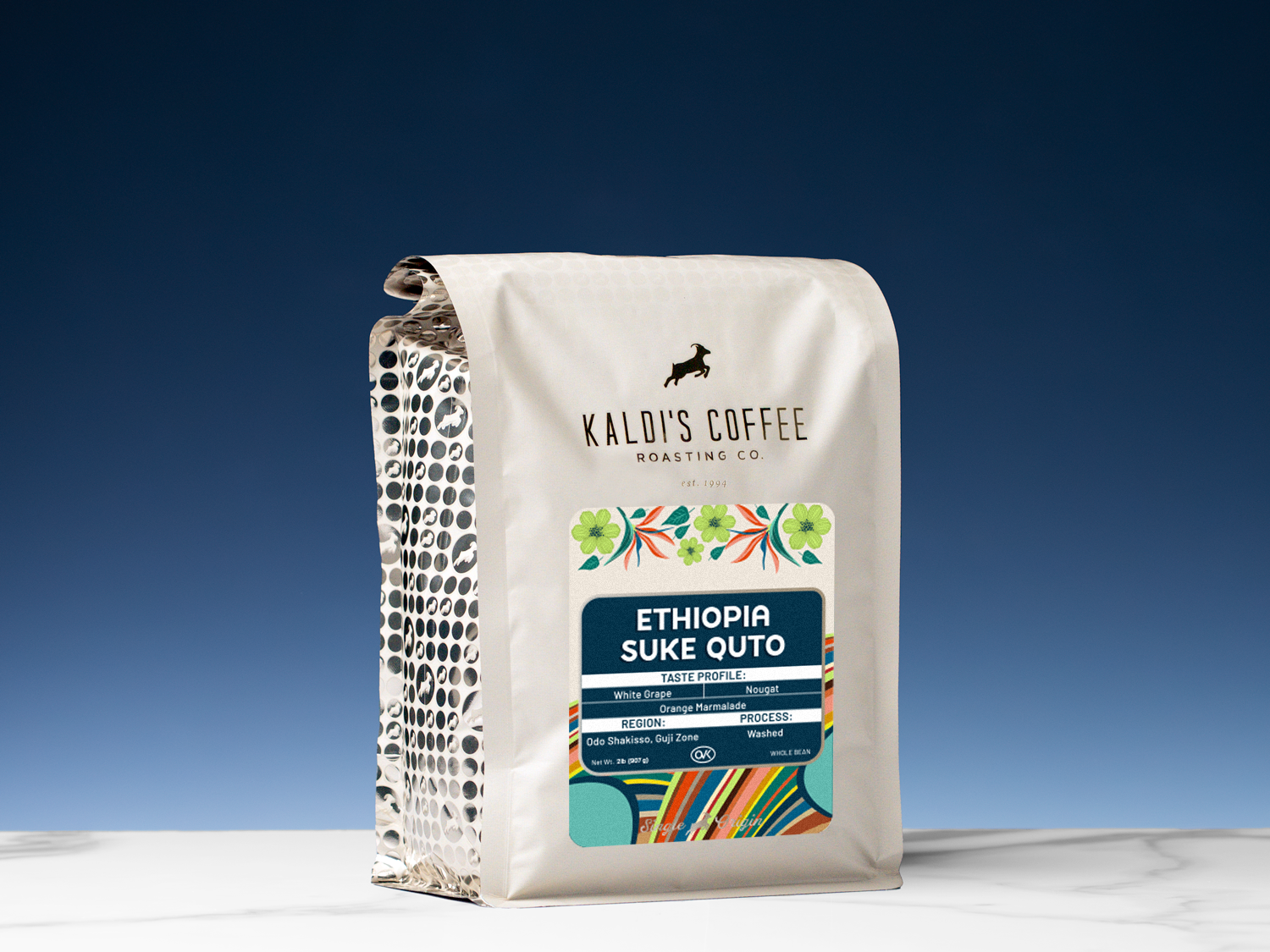 Kaldi's Coffee Roasting Co. coffee bag on a white surface with a blue gradient background