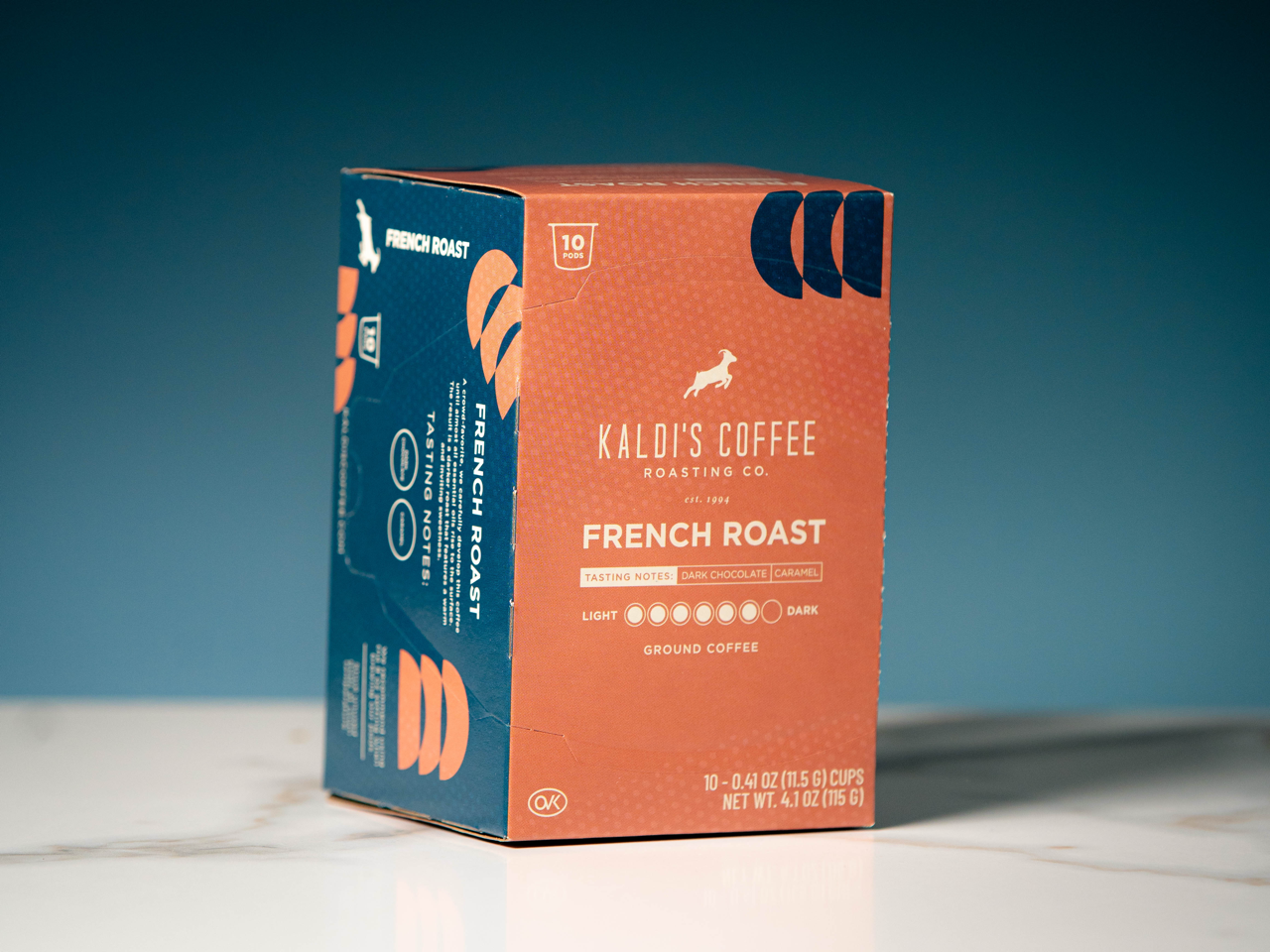 Vertical product image of coral French Roast Coffee Pods box
