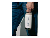 Person holding a white coffee tumbler with 'KALOIS COFFEE' branding.