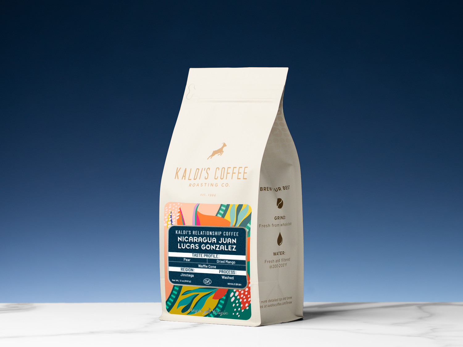 Kaldi's Coffee bag on a white surface with a blue gradient background. 