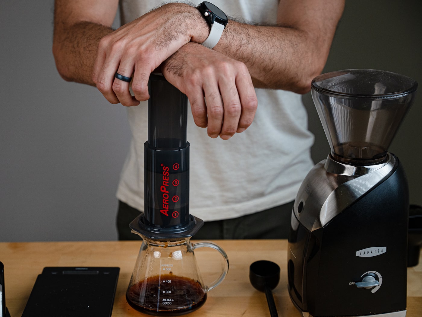 Pressing down on the Aeropress coffee maker