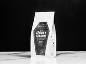 Coffee bag with 'Spooky Season' design on a black background