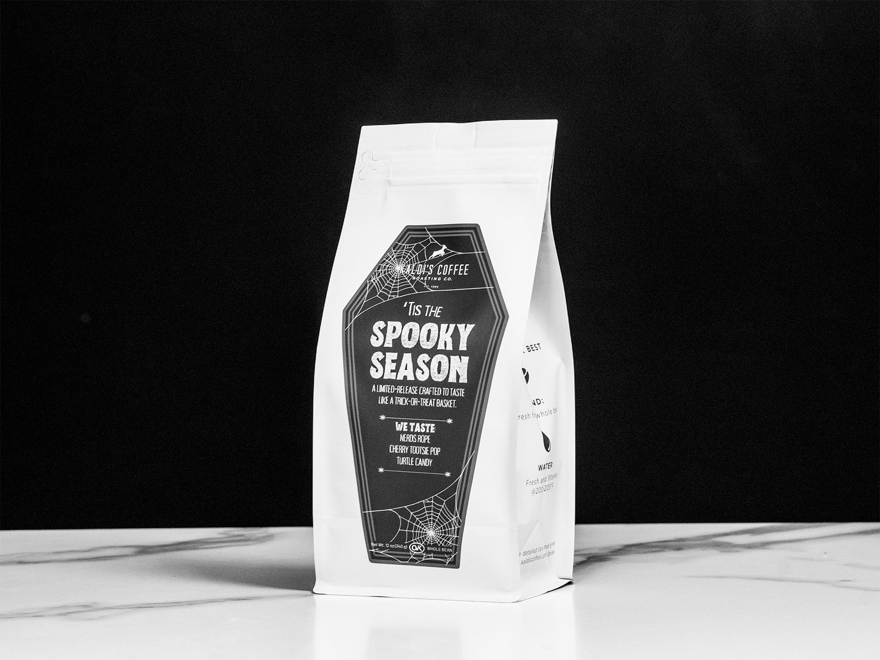 Coffee bag with 'Spooky Season' design on a black background