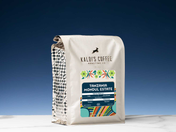 Kaldi's Coffee Roasting Co. coffee bag with colorful label on a blue background
