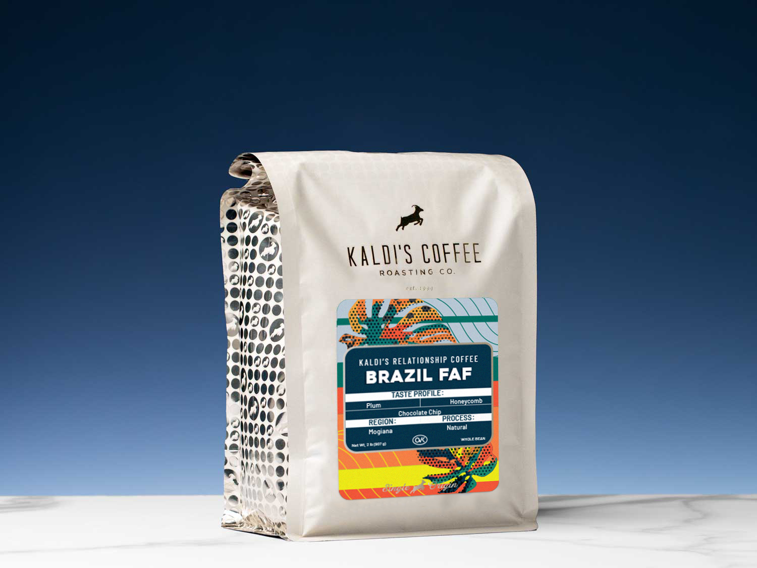 Kaldi's Coffee Roasting Co. coffee bag with colorful label on a blue background