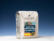 Kaldi's Coffee Roasting Co. coffee bag with colorful label on a blue background