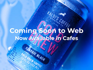 A cold can of coffee with the words "Coming Soon to Web - Now available in cafes" in white overlay